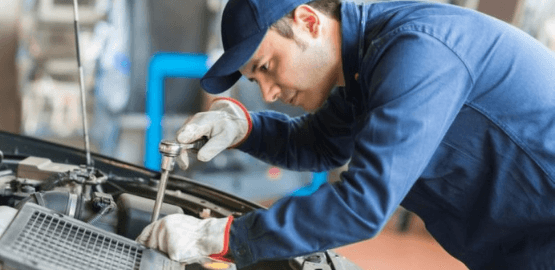 Man Repairing Auto Capot